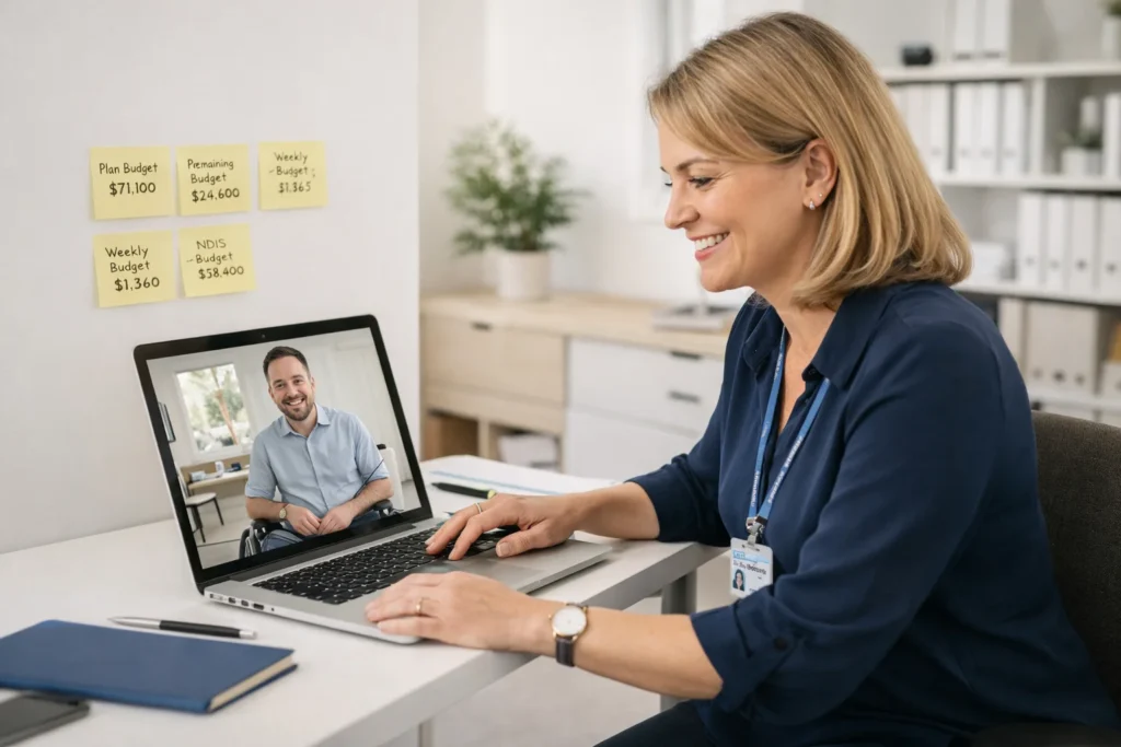 Professional female NDIS support coordinator working on laptop and video call in modern Australian office